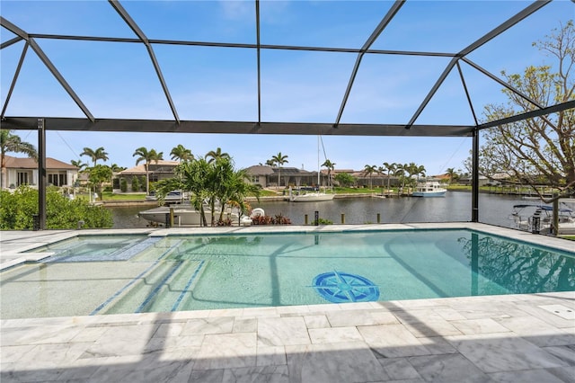 1306 Osprey Dr, Punta Gorda, FL 33950 - swimming pool with a water view, glass enclosure, a patio area, and a residential view