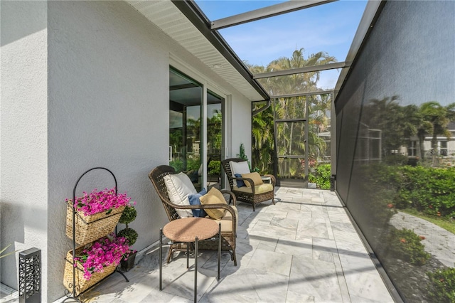 1306 Osprey Dr, Punta Gorda, FL 33950 - sunroom / solarium featuring floor to ceiling windows, a textured wall, and marble finish flooring