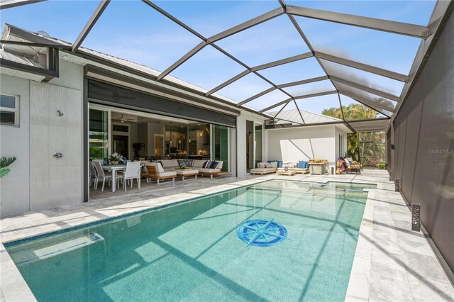 1306 Osprey Dr, Punta Gorda, FL 33950 - view of pool with an outdoor living space, a patio area, a pool with connected hot tub, and a lanai