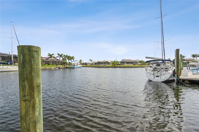1306 Osprey Dr, Punta Gorda, FL 33950 - dock area with a water view and a residential view