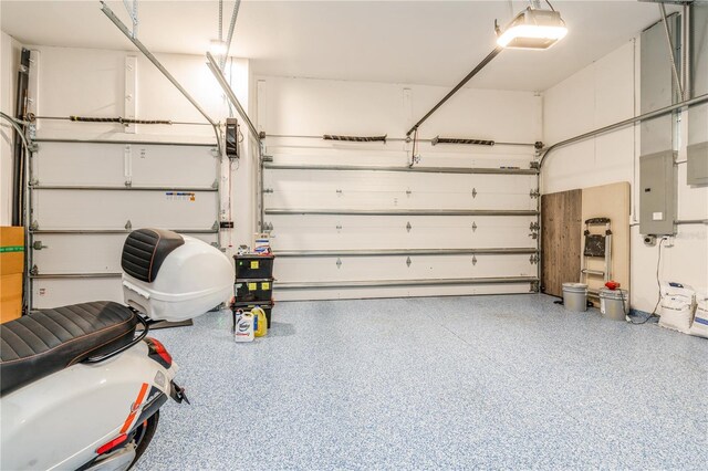 1306 Osprey Dr, Punta Gorda, FL 33950 - garage with electric panel and a garage door opener
