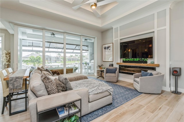 1306 Osprey Dr, Punta Gorda, FL 33950 - living area with a ceiling fan, wood finished floors, and baseboards