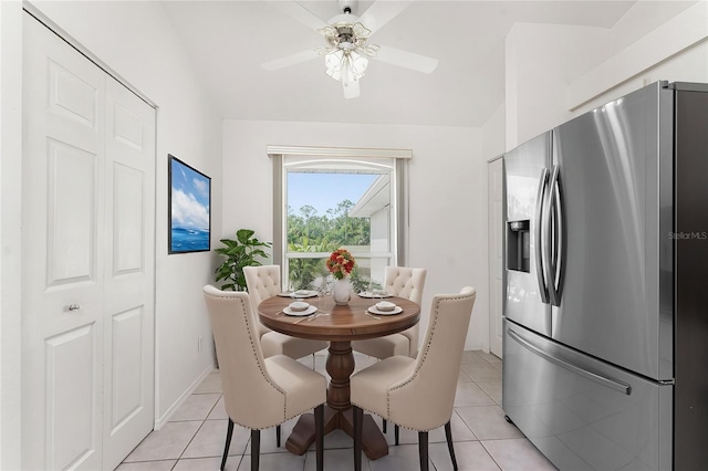 25046 Doredo Dr, Punta Gorda, FL 33955 - dining area featuring light tile patterned flooring, ceiling fan, and vaulted ceiling