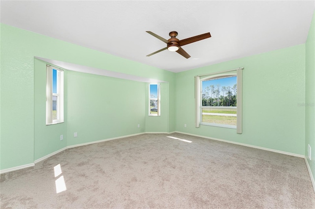 25046 Doredo Dr, Punta Gorda, FL 33955 - carpeted empty room with a ceiling fan and baseboards