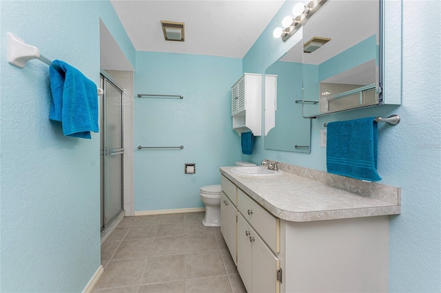 25046 Doredo Dr, Punta Gorda, FL 33955 - bathroom featuring a shower stall, tile patterned flooring, toilet, vanity, and baseboards