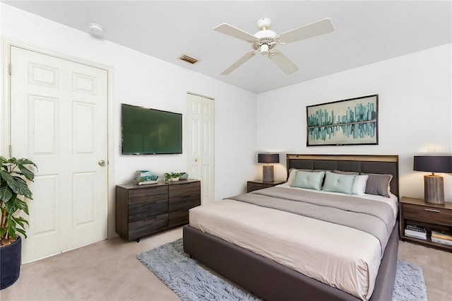 25046 Doredo Dr, Punta Gorda, FL 33955 - bedroom featuring light carpet, a ceiling fan, and a closet