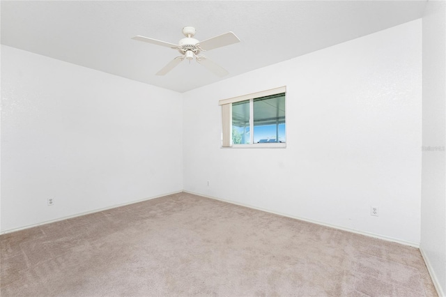 25046 Doredo Dr, Punta Gorda, FL 33955 - unfurnished room with carpet flooring, ceiling fan, and baseboards