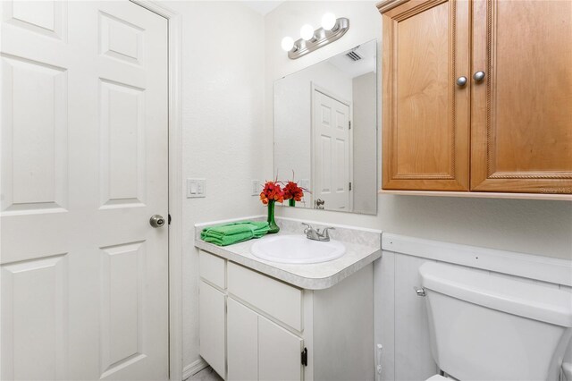 25046 Doredo Dr, Punta Gorda, FL 33955 - bathroom with vanity and toilet