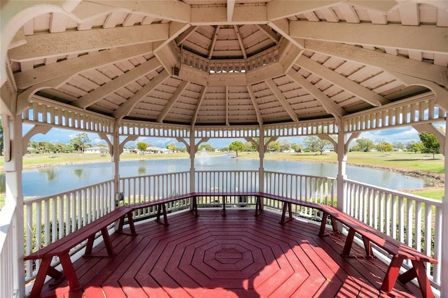 25046 Doredo Dr, Punta Gorda, FL 33955 - wooden terrace featuring a gazebo and a water view