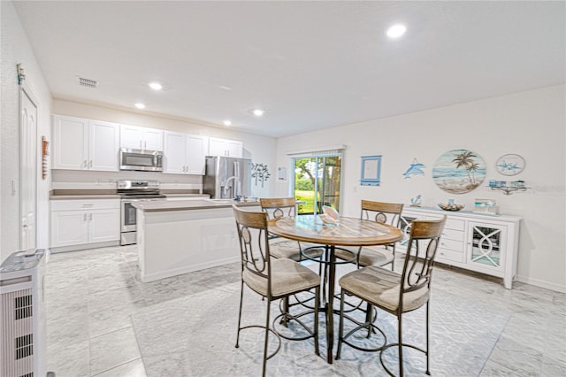 25324 Aysen Dr, Punta Gorda, FL 33983 - dining space featuring recessed lighting and baseboards