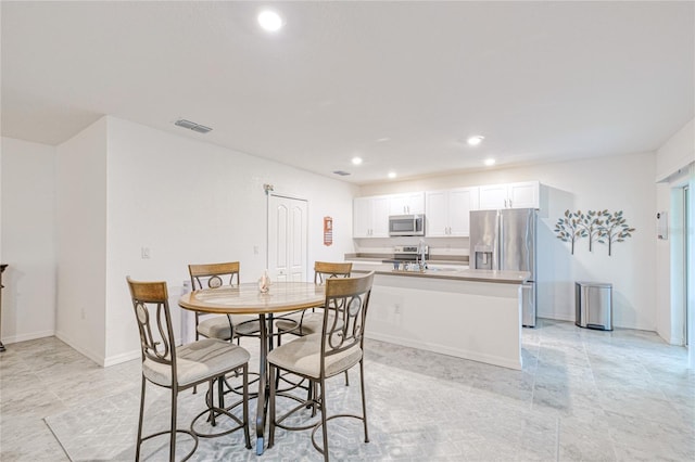 25324 Aysen Dr, Punta Gorda, FL 33983 - dining room featuring recessed lighting and baseboards