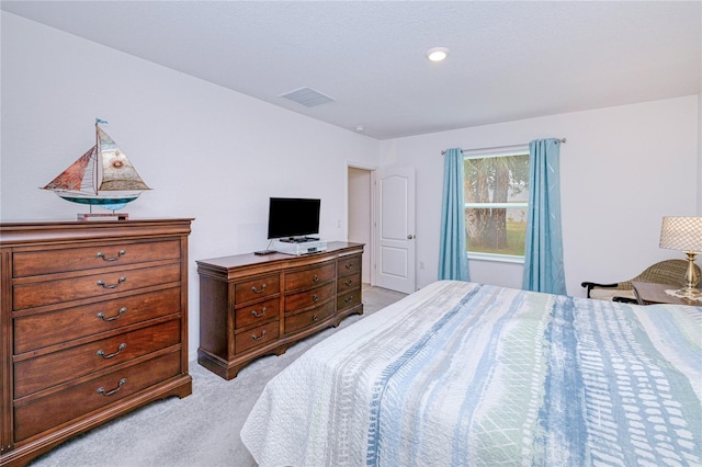 25324 Aysen Dr, Punta Gorda, FL 33983 - bedroom featuring light carpet