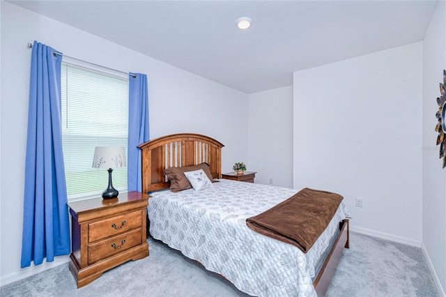 25324 Aysen Dr, Punta Gorda, FL 33983 - carpeted bedroom featuring baseboards