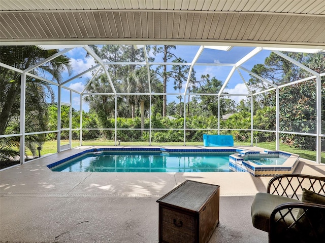 8377 Mambo Ave, North Port, FL 34291 - view of swimming pool with a patio, view of scattered trees, a pool with connected hot tub, and a lanai