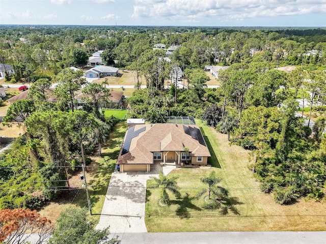 8377 Mambo Ave, North Port, FL 34291 - aerial view of property and surrounding area featuring a heavily wooded area