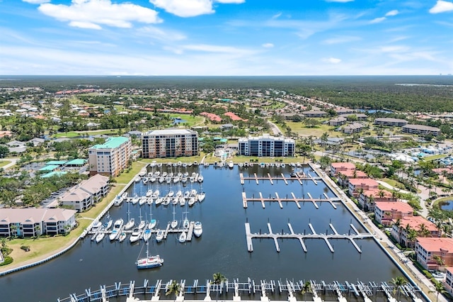 aerial view of numerous boat docks and a nearby body of water