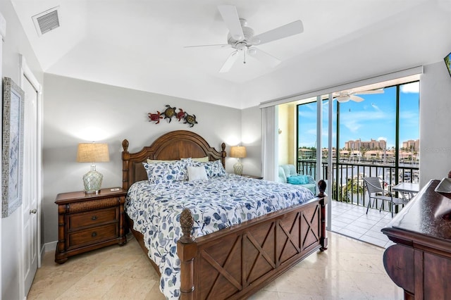 bedroom with access to outside and a ceiling fan