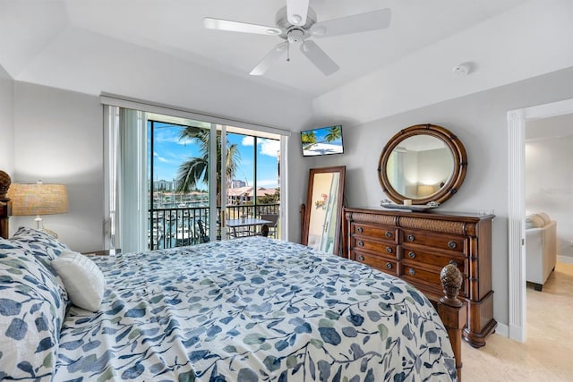 bedroom with access to outside, vaulted ceiling, and a ceiling fan