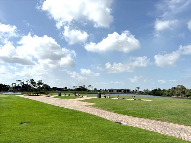 2090 Matecumbe Key Rd Unit 1404, Punta Gorda, FL 33955 - surrounding community featuring a yard and a water view