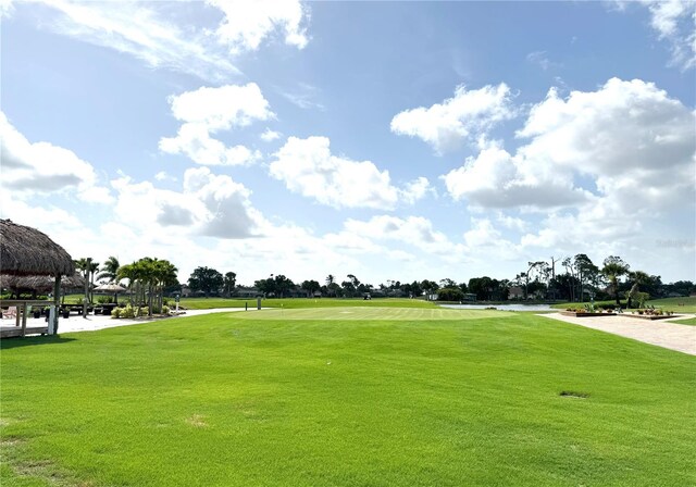2090 Matecumbe Key Rd Unit 1404, Punta Gorda, FL 33955 - view of property's community featuring a yard and golf course view