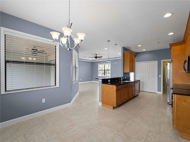 97 Pine Valley Ln, Rotonda West, FL 33947 - kitchen featuring appliances with stainless steel finishes, dark countertops, ceiling fan, a chandelier, and recessed lighting