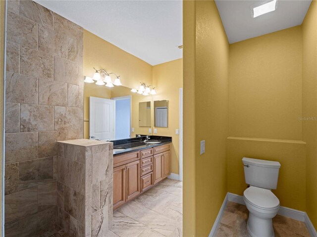 97 Pine Valley Ln, Rotonda West, FL 33947 - full bath with double vanity, toilet, and baseboards