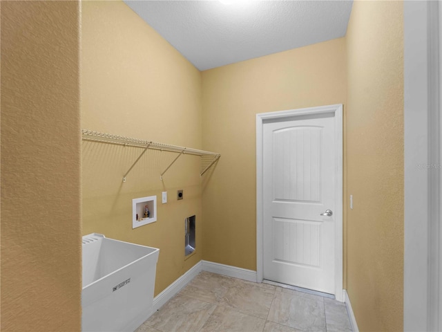 97 Pine Valley Ln, Rotonda West, FL 33947 - clothes washing area featuring hookup for an electric dryer, baseboards, and washer hookup