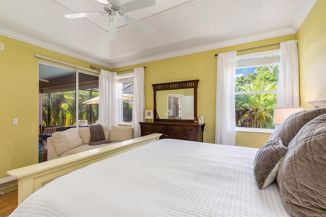 bedroom with ornamental molding, a ceiling fan, wood finished floors, and access to outside
