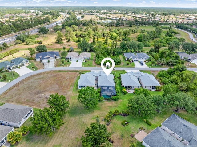 view of property location featuring nearby suburban area