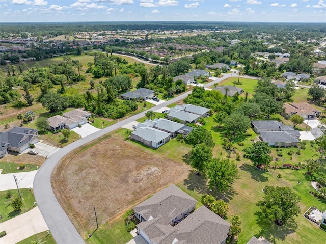aerial view of property's location featuring nearby suburban area