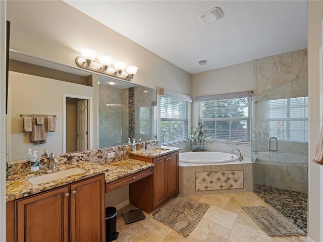 11982 Granite Woods Loop, Venice, FL 34292 - full bath featuring a stall shower, double vanity, and a bath