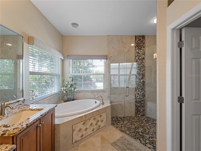 11982 Granite Woods Loop, Venice, FL 34292 - full bath with a garden tub, a stall shower, and vanity