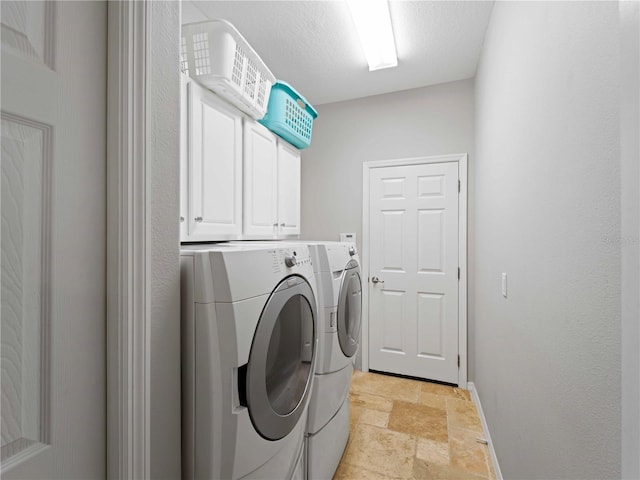 11982 Granite Woods Loop, Venice, FL 34292 - laundry room featuring stone tile flooring, separate washer and dryer, cabinet space, and baseboards