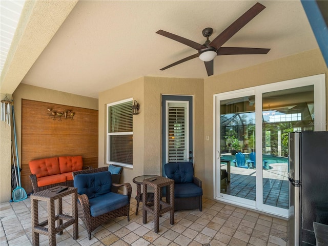 11982 Granite Woods Loop, Venice, FL 34292 - view of patio with ceiling fan and outdoor lounge area