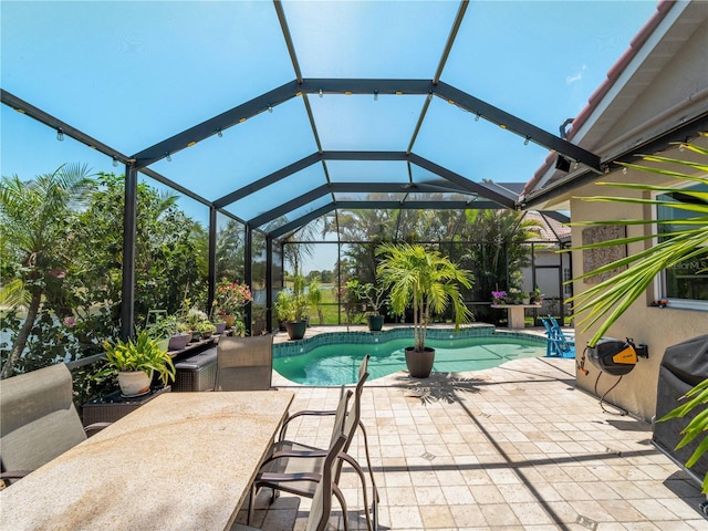11982 Granite Woods Loop, Venice, FL 34292 - swimming pool featuring a patio area and glass enclosure