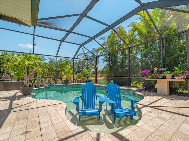 11982 Granite Woods Loop, Venice, FL 34292 - swimming pool with a patio area and glass enclosure
