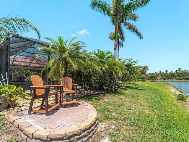 11982 Granite Woods Loop, Venice, FL 34292 - view of green lawn featuring a water view, a patio area, and a lanai