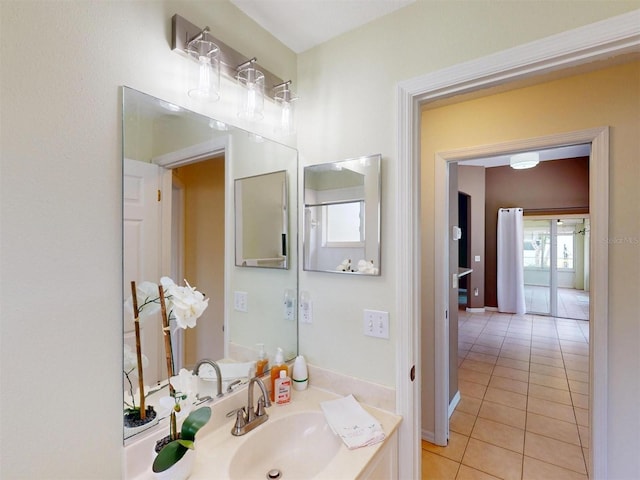 4027 Quaker Ln, North Port, FL 34288 - bathroom with a sink and tile patterned floors