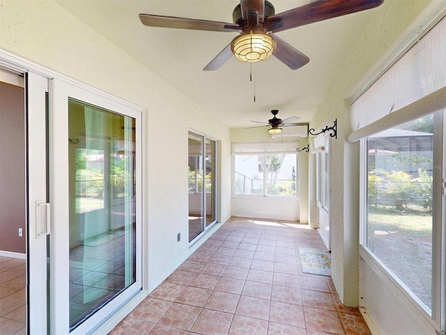 4027 Quaker Ln, North Port, FL 34288 - unfurnished sunroom with ceiling fan, tile patterned floors, and baseboards