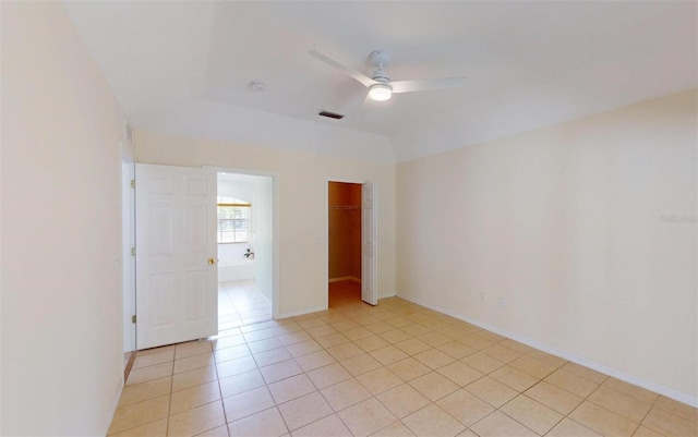 4027 Quaker Ln, North Port, FL 34288 - spare room featuring a ceiling fan, light tile patterned floors, and baseboards