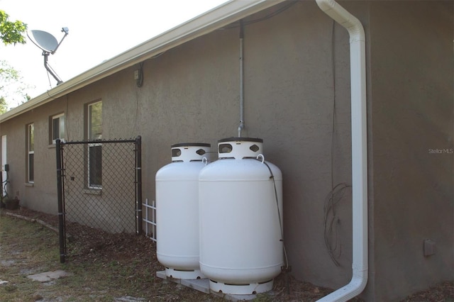 4027 Quaker Ln, North Port, FL 34288 - view of home's exterior featuring stucco siding