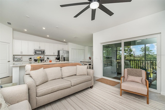 43984 Boardwalk Loop Unit 1726, Punta Gorda, FL 33982 - living room featuring ceiling fan, vaulted ceiling, recessed lighting, and baseboards