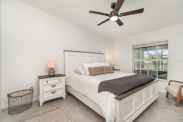 43984 Boardwalk Loop Unit 1726, Punta Gorda, FL 33982 - bedroom featuring light tile patterned floors, baseboards, access to exterior, lofted ceiling, and a ceiling fan