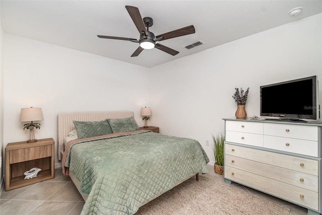43984 Boardwalk Loop Unit 1726, Punta Gorda, FL 33982 - bedroom with ceiling fan, light tile patterned floors, and baseboards