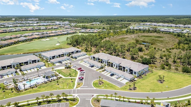 43984 Boardwalk Loop Unit 1726, Punta Gorda, FL 33982 - aerial perspective of suburban area with a golf club and a nearby body of water