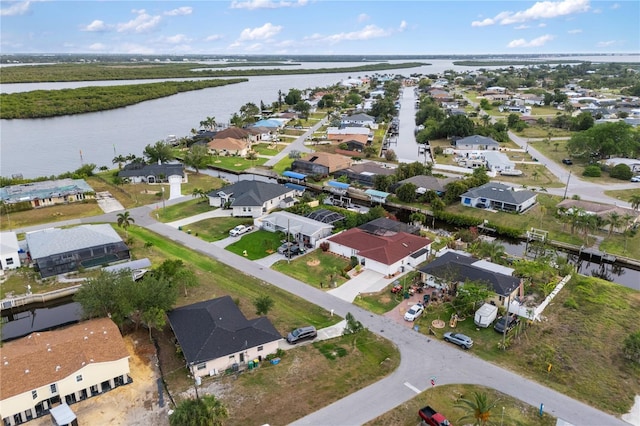 3301 Santa Barbara Dr, Punta Gorda, FL 33983 - aerial view of property and surrounding area with a large body of water and nearby suburban area