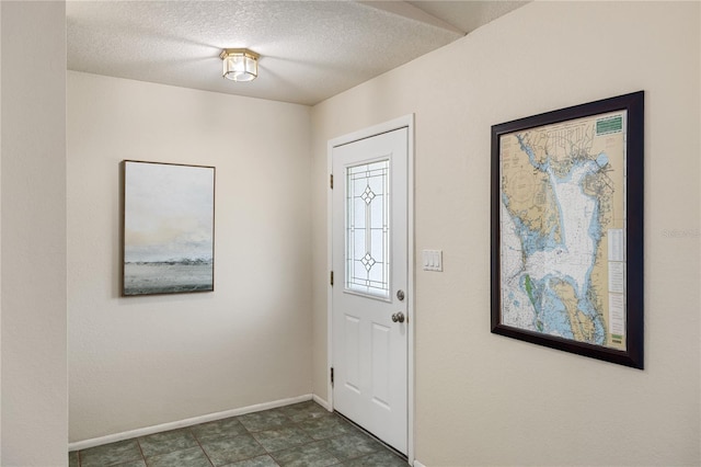 3301 Santa Barbara Dr, Punta Gorda, FL 33983 - entrance foyer with baseboards and a textured ceiling
