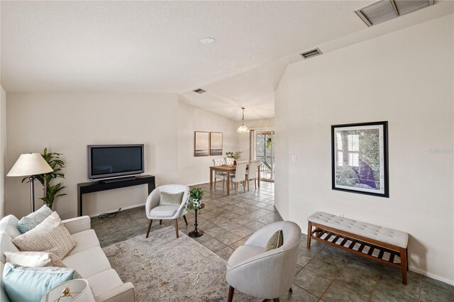 3301 Santa Barbara Dr, Punta Gorda, FL 33983 - living area with lofted ceiling and baseboards