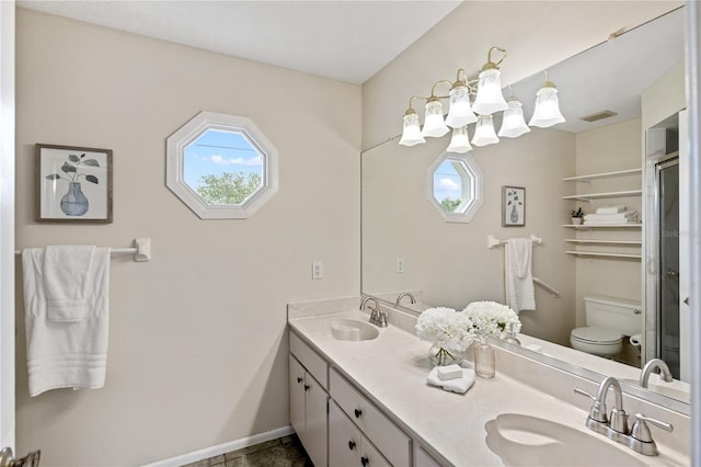 3301 Santa Barbara Dr, Punta Gorda, FL 33983 - full bathroom with healthy amount of natural light, toilet, double vanity, and a shower stall