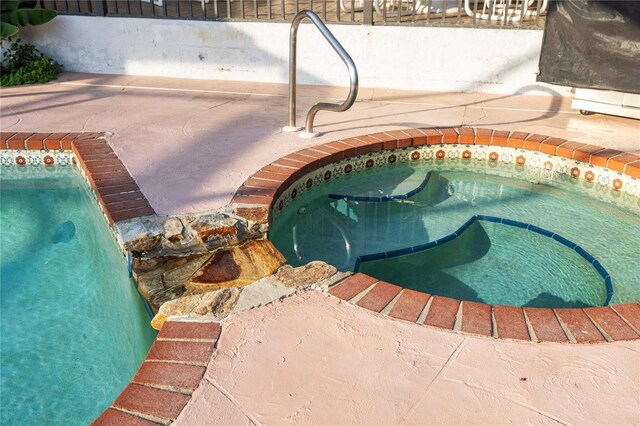 3301 Santa Barbara Dr, Punta Gorda, FL 33983 - view of pool featuring a pool and an in-ground hot tub